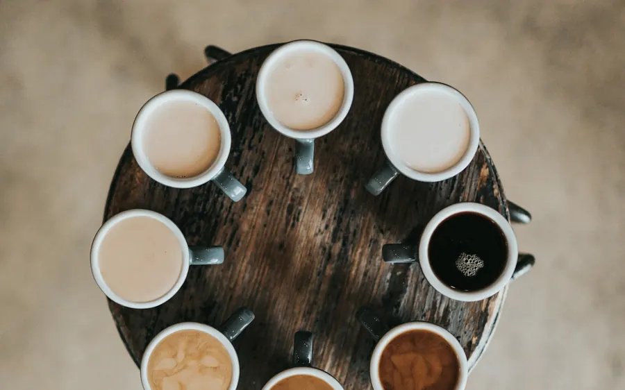 A tasting flight of coffees seen from above