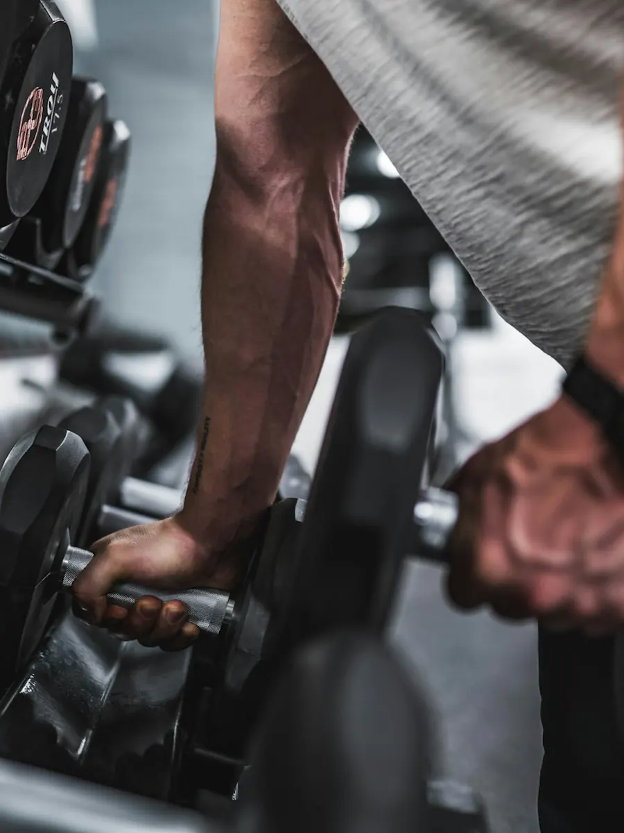 Lifting a dumbbell from the rack